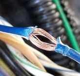 Close-up of a broken electrical cable

AI-generated content may be incorrect., Picture