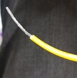 A close-up of a yellow wire

AI-generated content may be incorrect., Picture