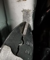 A pliers cutting a pipe

AI-generated content may be incorrect., Picture